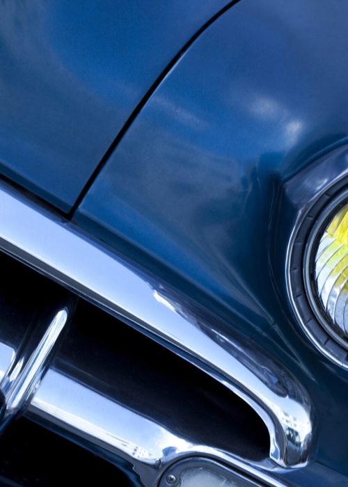 Close up of a vintage car in a street